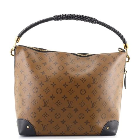 LOUIS VUITTON Reverse Monogram Triangle Softy.